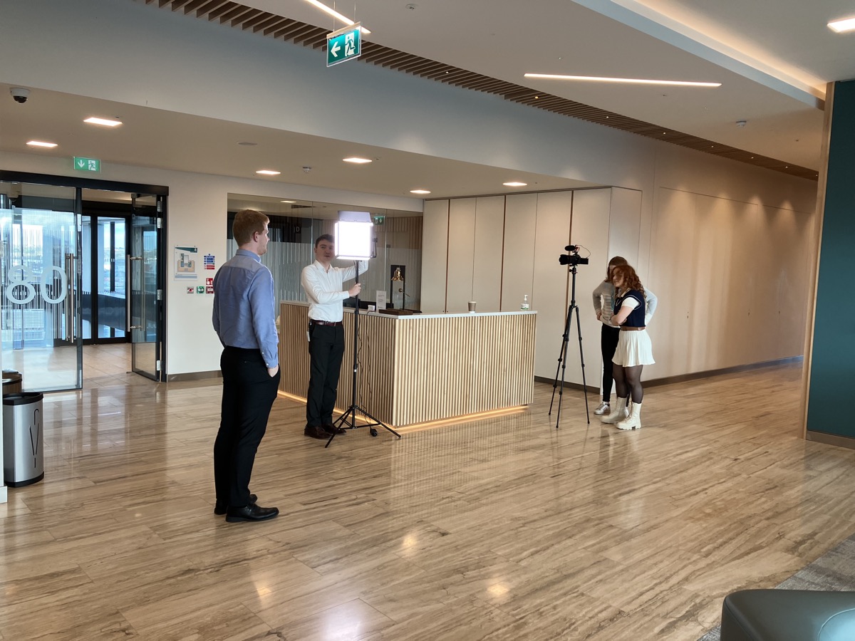 Training a team to light and film in an office reception